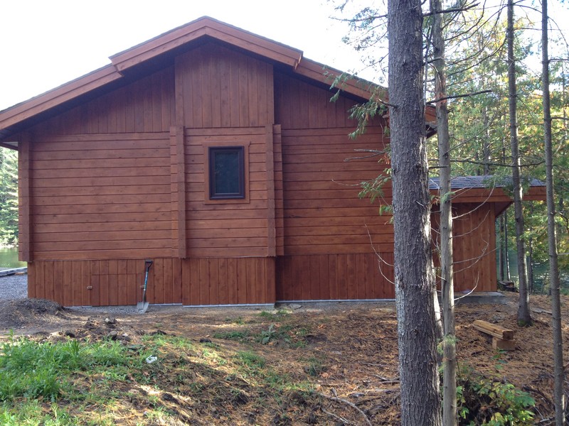 Rear view of cabin
Stained 6X8 tongue and groove white cedar lumber